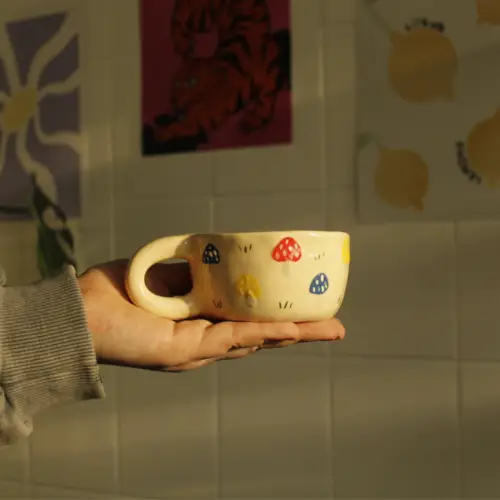 cup with hand-painted mushrooms