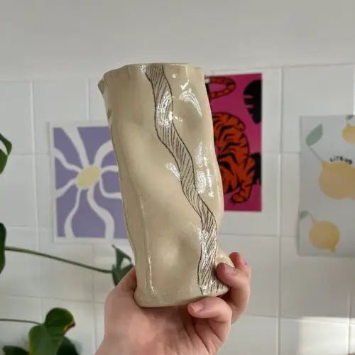 Tall squiggly vase with pencil design