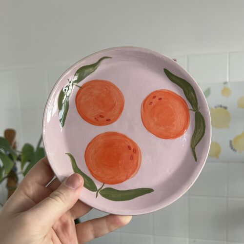 Plate with oranges